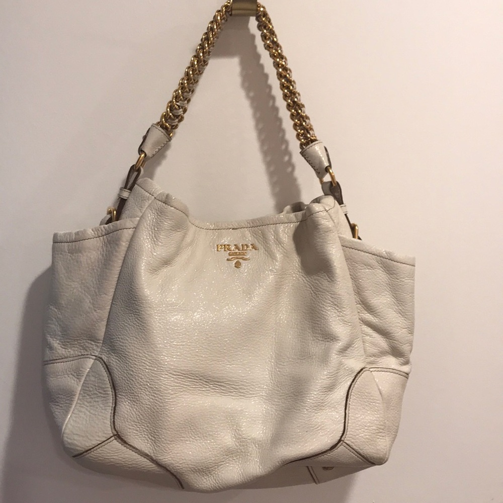 A used 100 % authentic Prada chain shoulder bag
